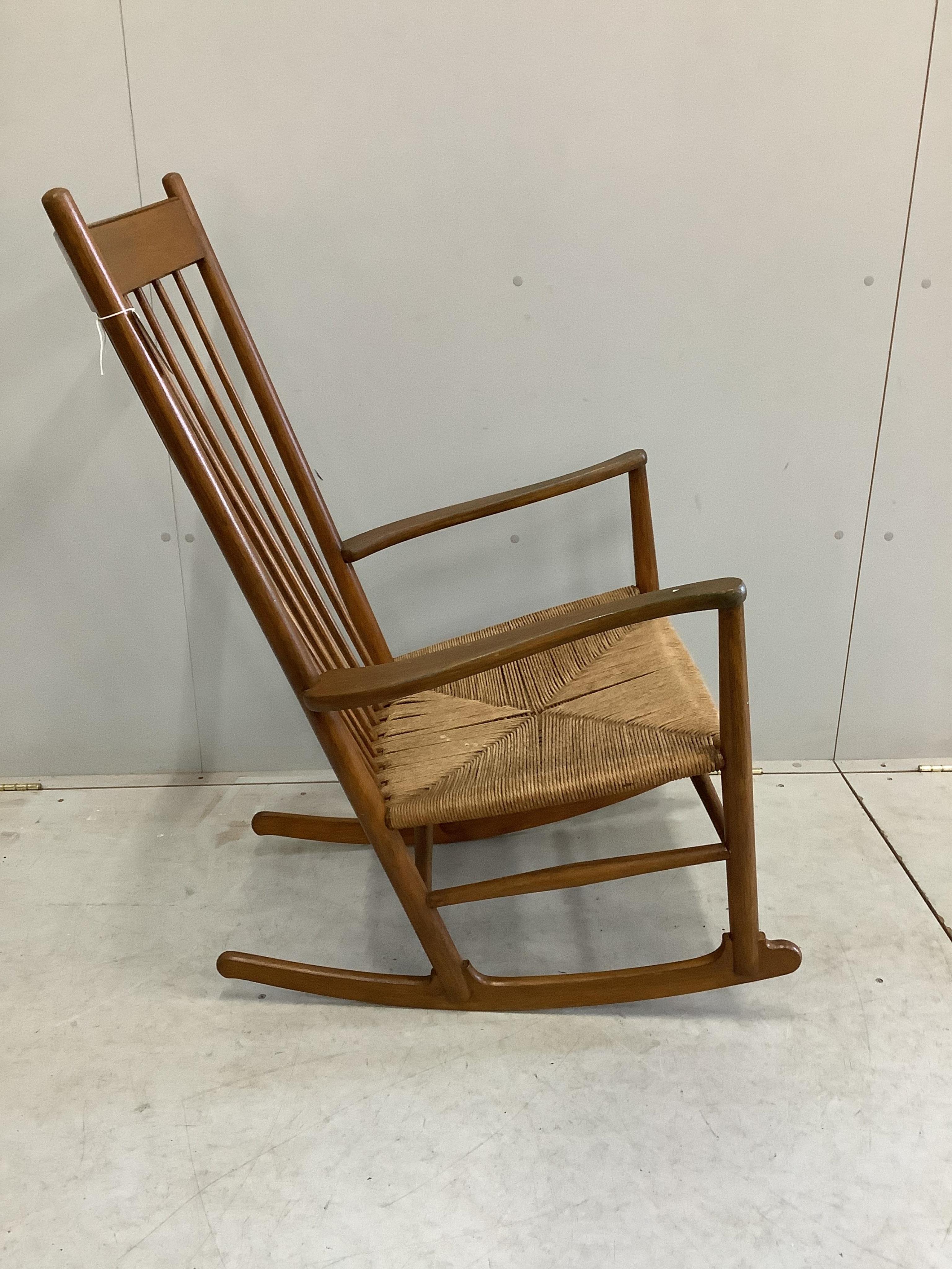 A Hans Wegner style rocking chair, width 63cm, height 106cm. Condition - fair